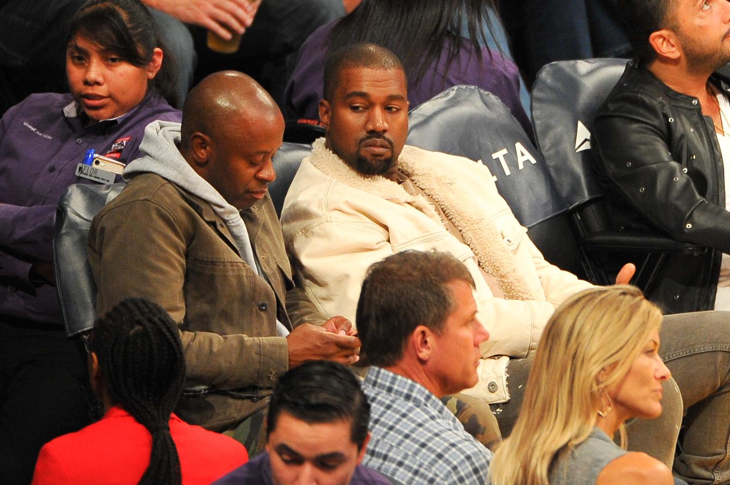 Rapper Kanye West sit at a basketball game between the Los Angeles Lakers and the Memphis Grizzlies at Staples Center.