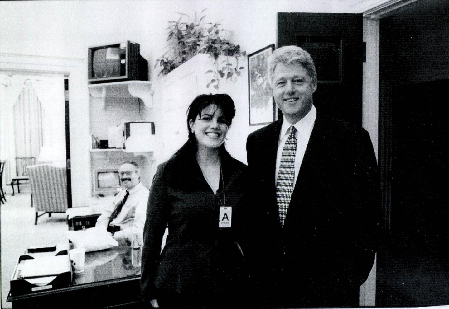 Monica Lewinsky stands next to President Bill Clinton in 1998. The two had an affair.