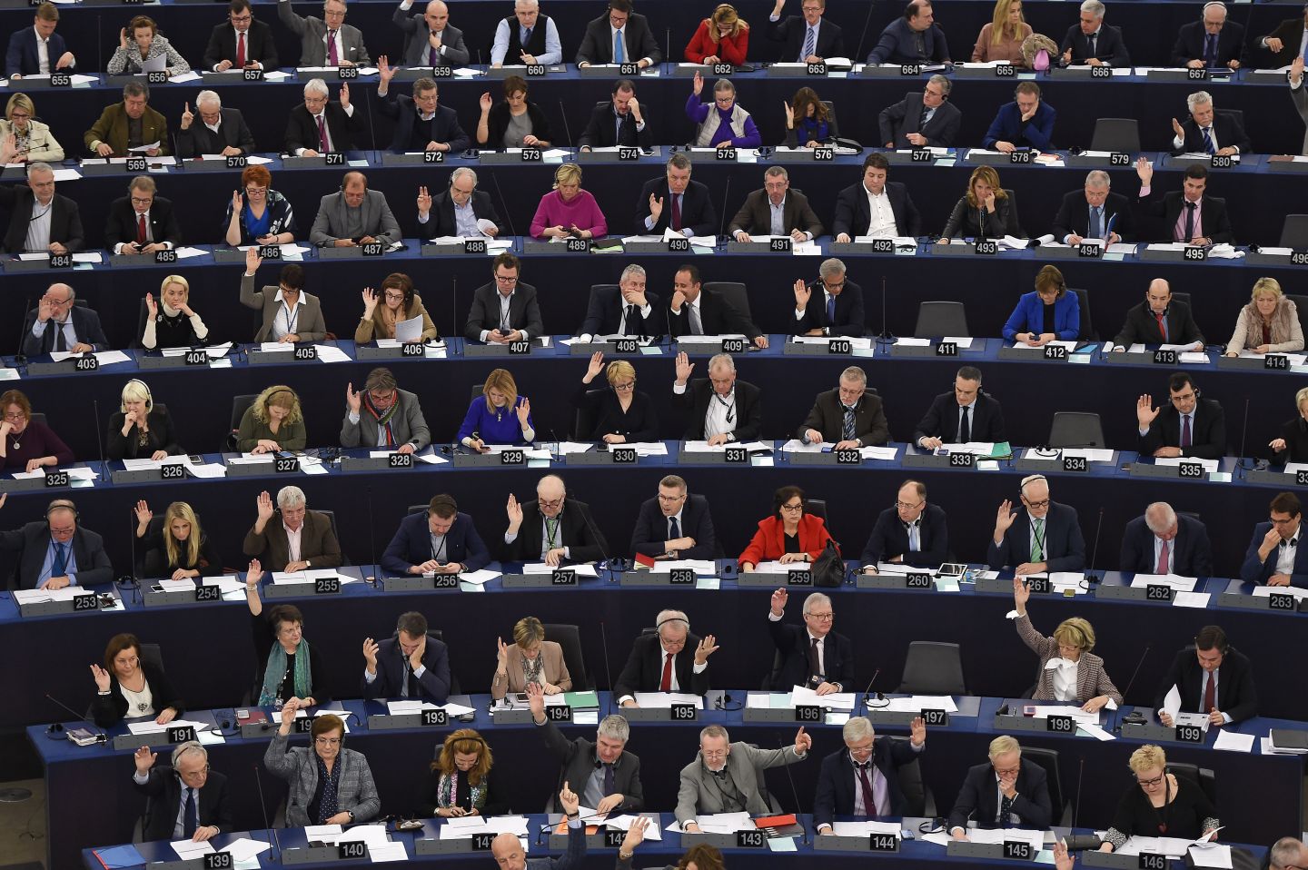 Members of the European Parliament take part in a voting session at the European Parliament.