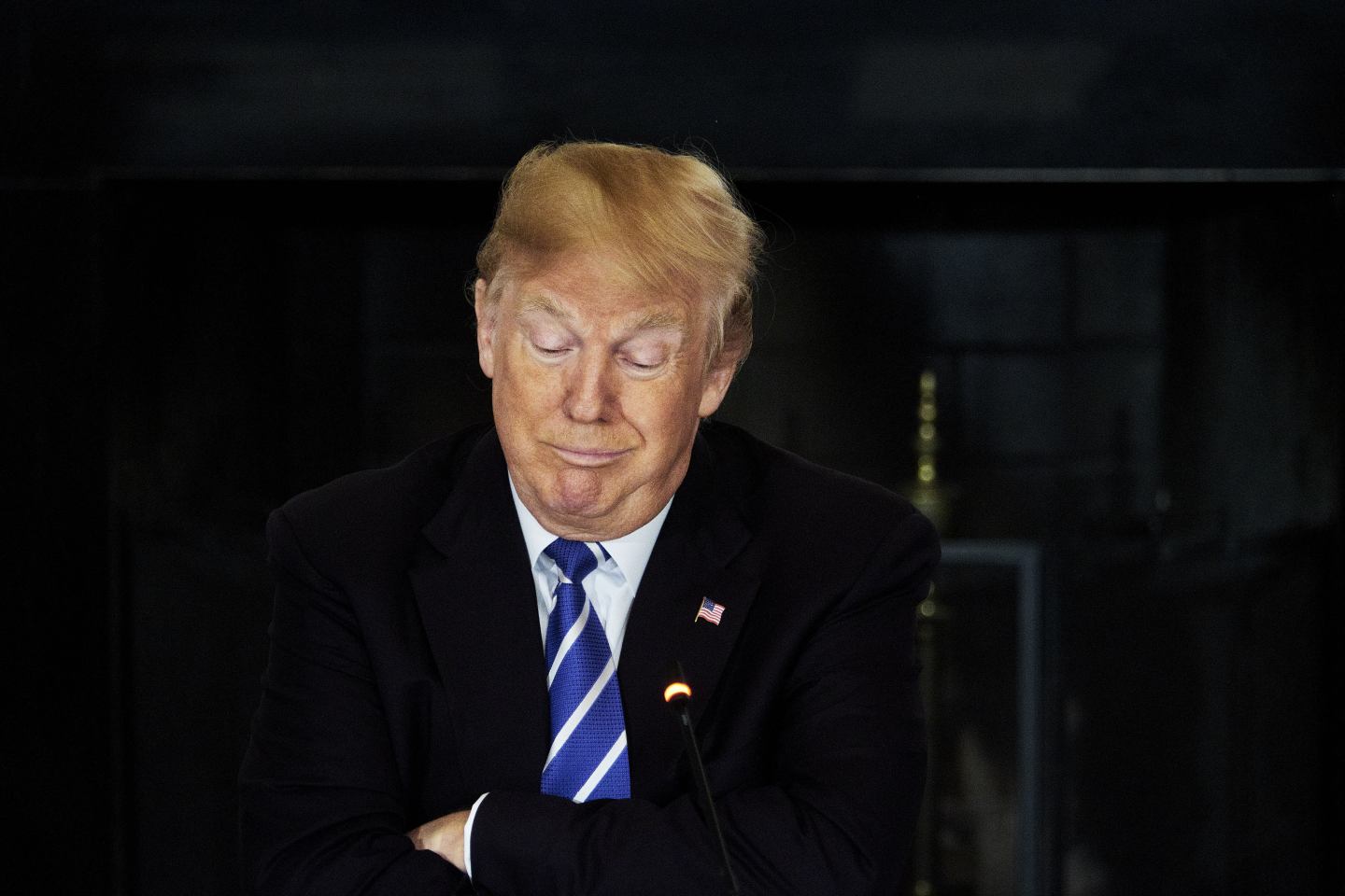 U.S. President Donald Trump reacts during an infrastructure initiative meeting at the State Dining Room of the White House in Washington, D.C., U.S., on Monday, Feb. 12, 2018.