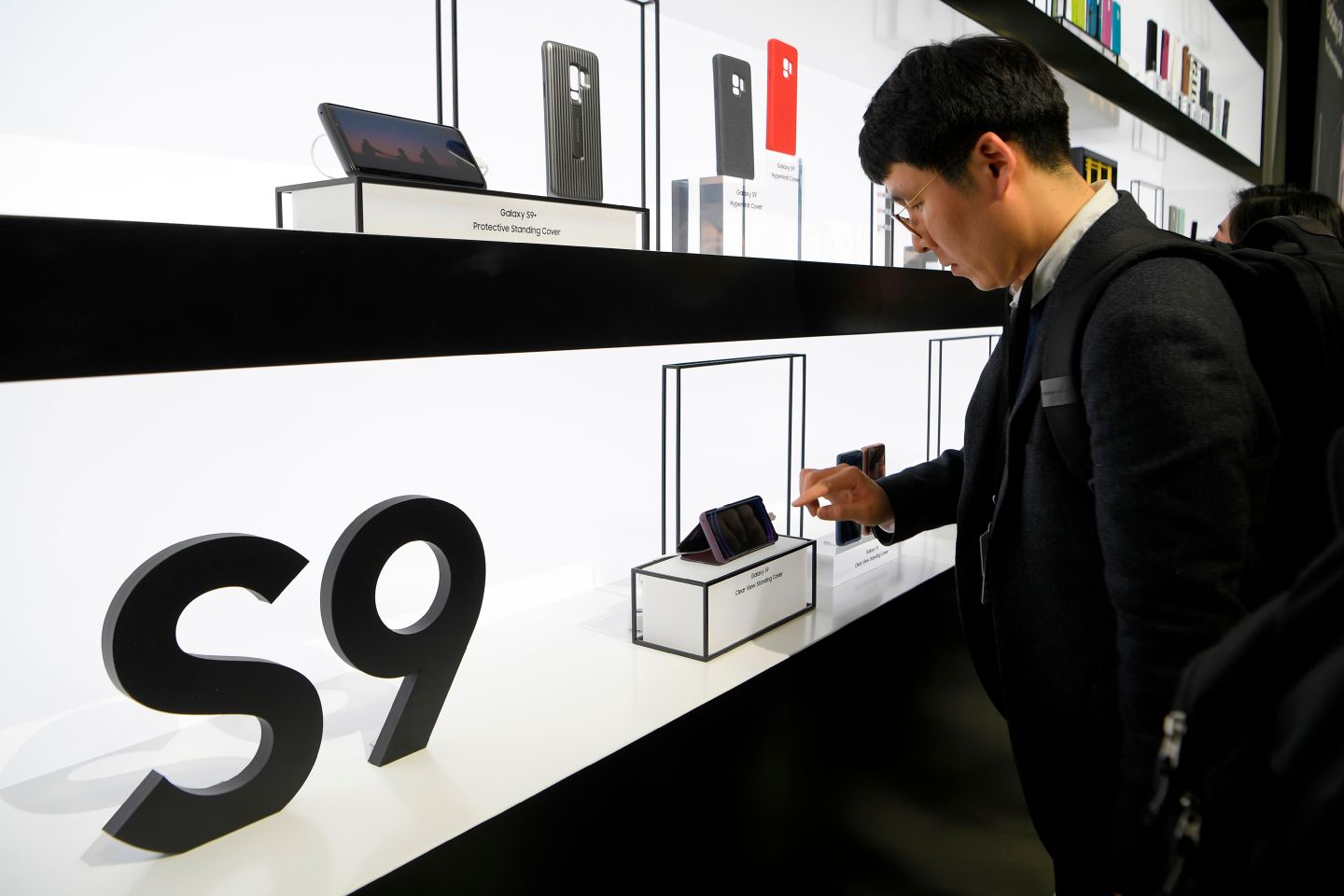 A man checks the new Samsung Galaxy S9 mobile phone.