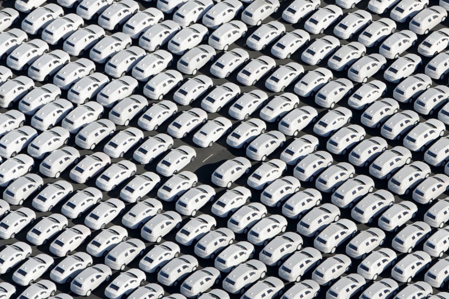 New cars from German automaker Volkswagen stand ready for shipping next to the VW plant in Emden, northwestern Germany, on Sept. 30, 2015.