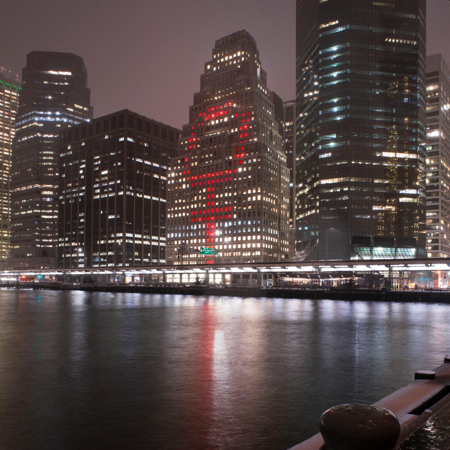 On International Women’s Day, Female Gender Symbol Lights Up City Skylines