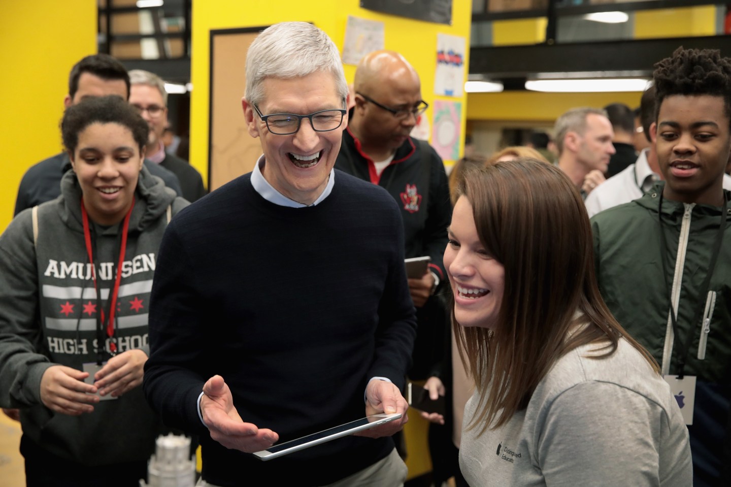 Apple CEO Tim Cook gets at an event to introduce the new 9.7-inch Apple iPad at Lane Tech College Prep High School in Chicago, Illinois.