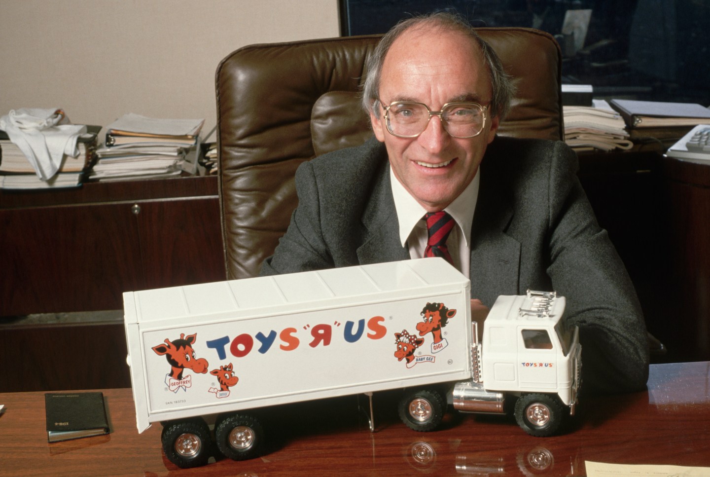 Charles Lazarus, the creator and founder of Toys "R" Us, is seen with Toy Truck