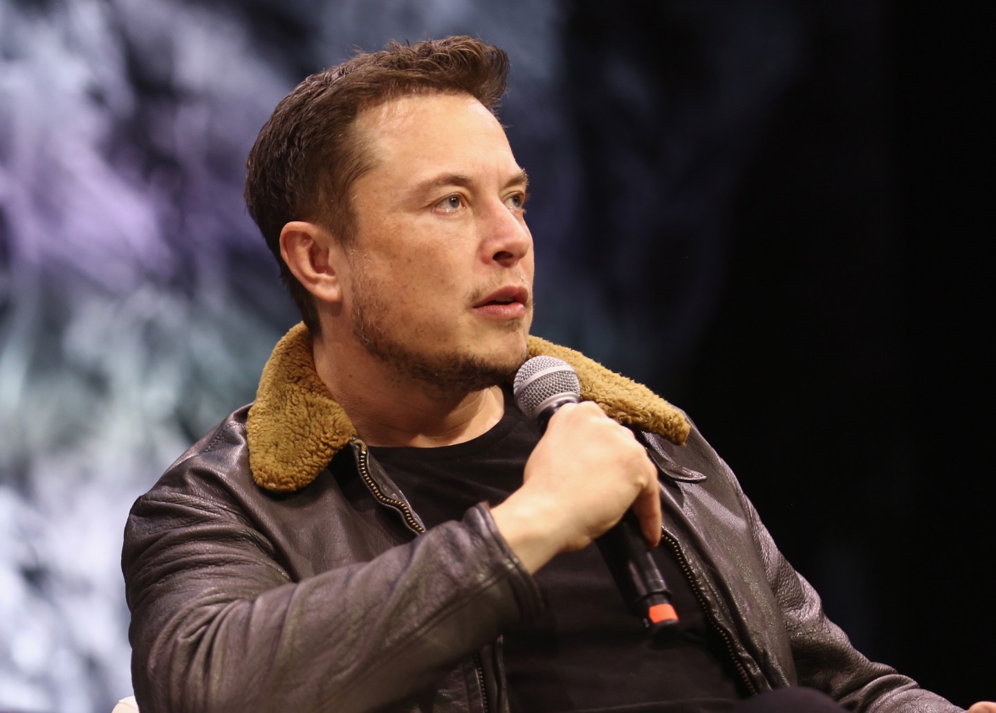 Tesla and SpaceX CEO Elon Musk speaks onstage at the South by Southwest festival.