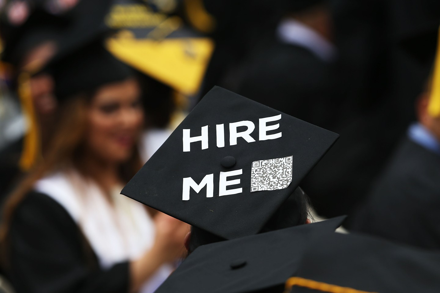 College graduation cap reads: hire me