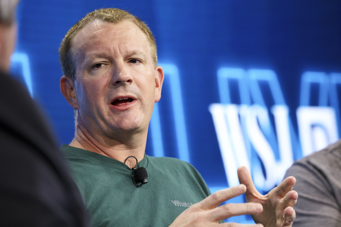 Brian Acton, co-founder of WhatsApp Inc., speaks on stage at a conference
