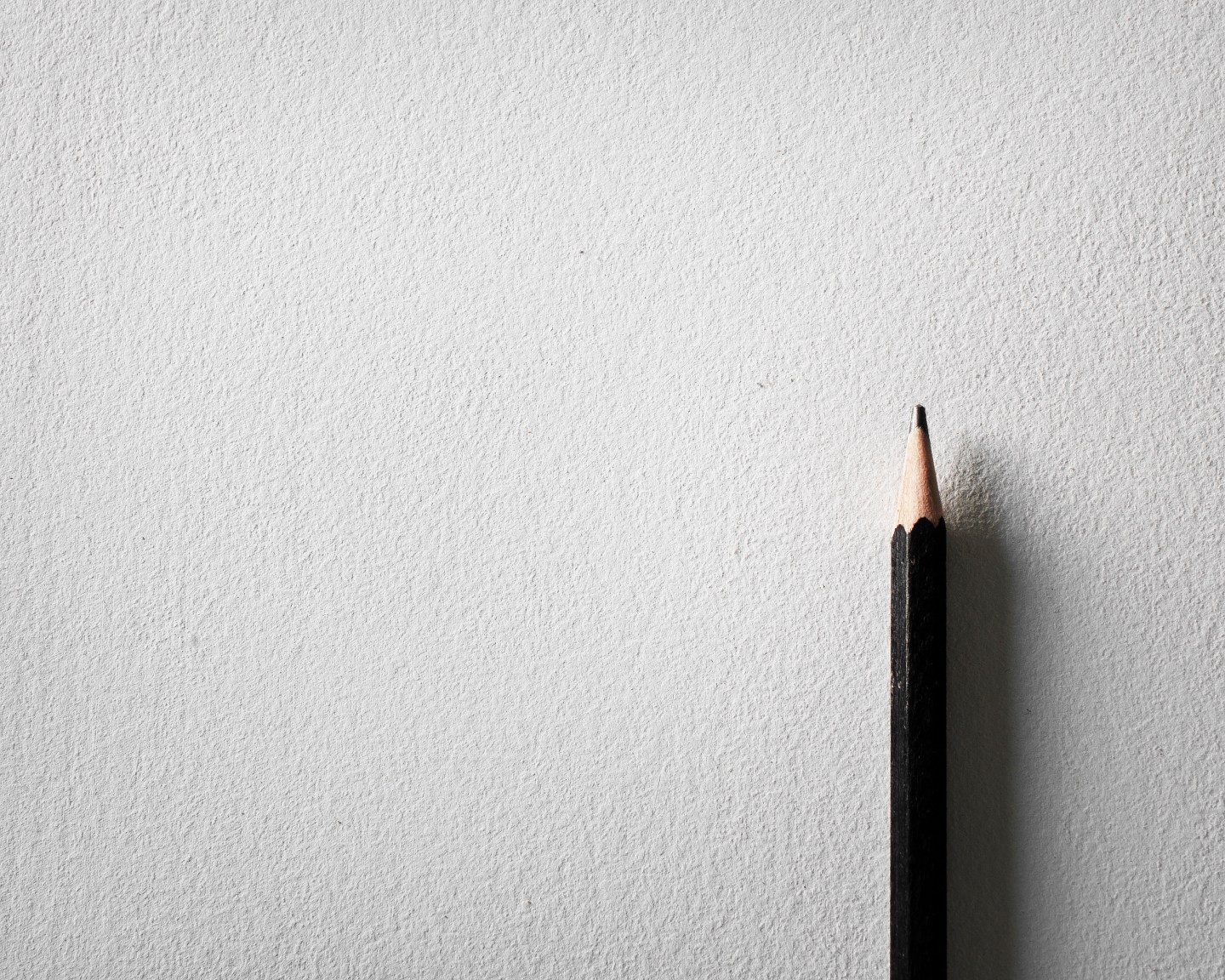 Close-Up Of Pencils On Paper