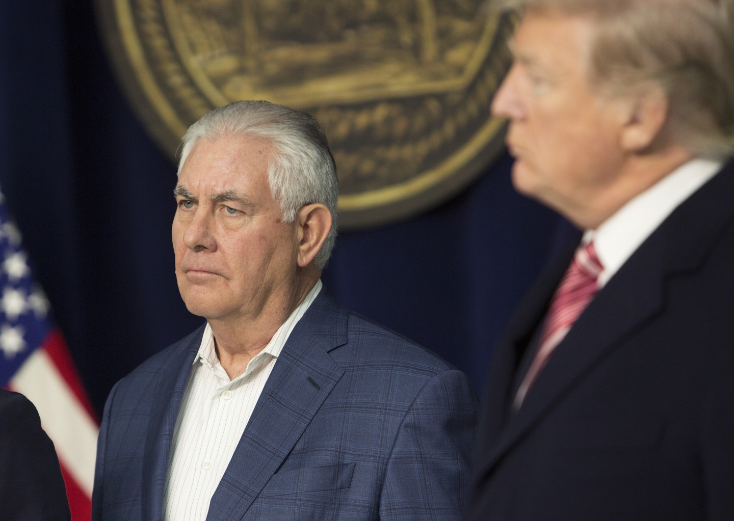 Rex Tillerson appears next to President Donald Trump