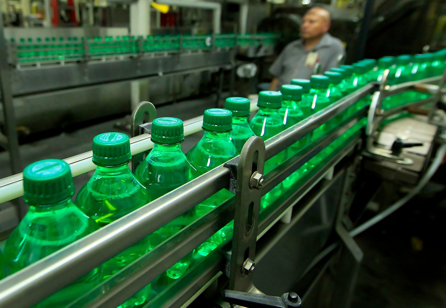 Bottles of Coca-Cola Co.'s Sprite on a conveyor belt at the company's bottling plant in Salt Lake City, Utah. Companies may start using more plastic bottles following Donald Trump's tariffs on steel and aluminum.