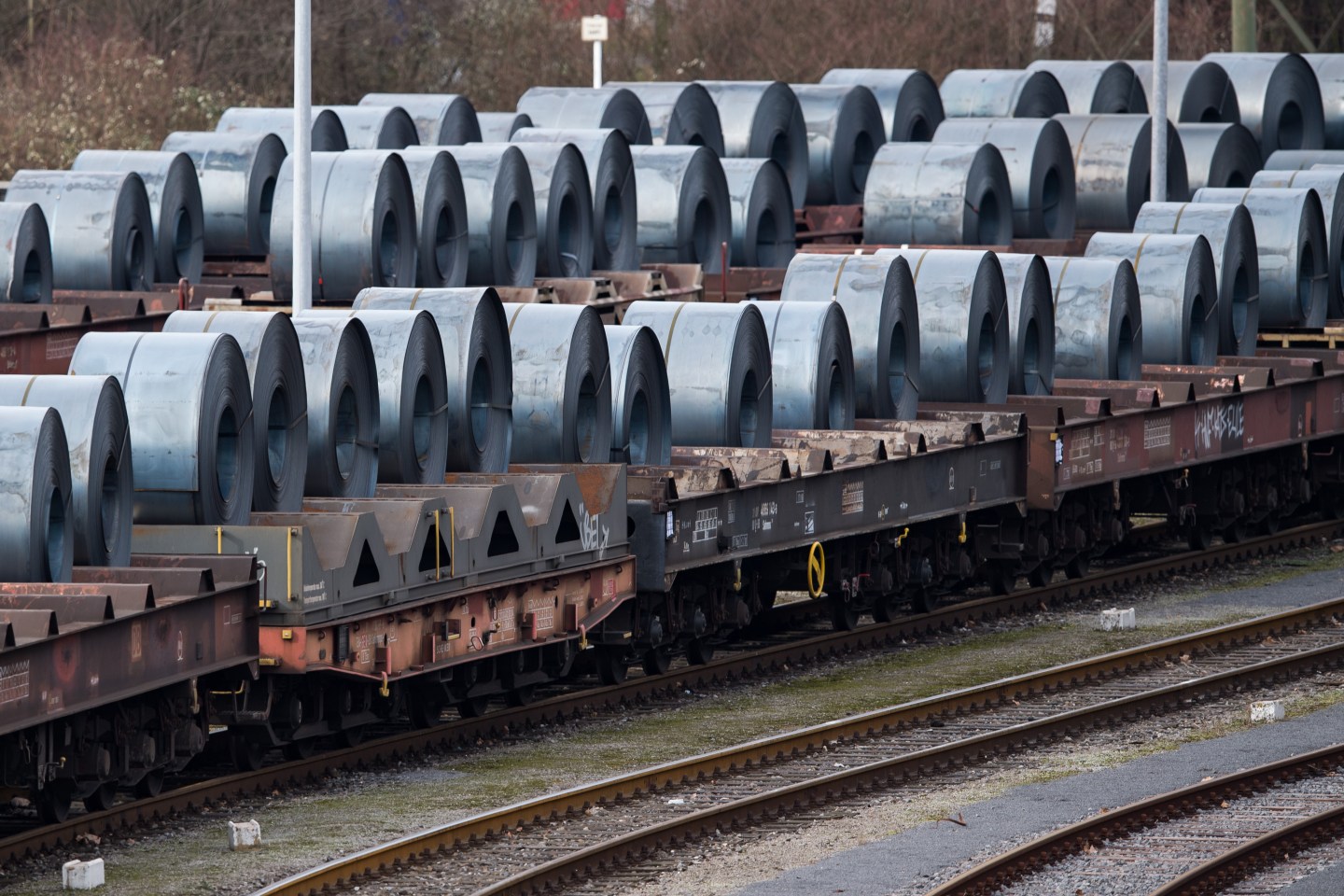 Coils of steel on trains in front of the ThyssenKrupp steel mill in Duisburg, Germany. Trump's tariffs have raised fears of a trade war.