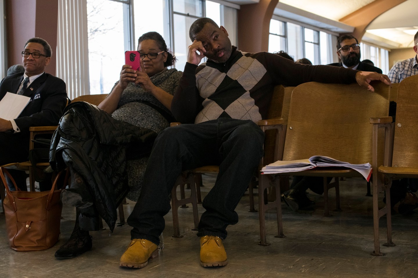 Local activist Quincy Murphy, of Flint, Michigan, attends a city council meeting.