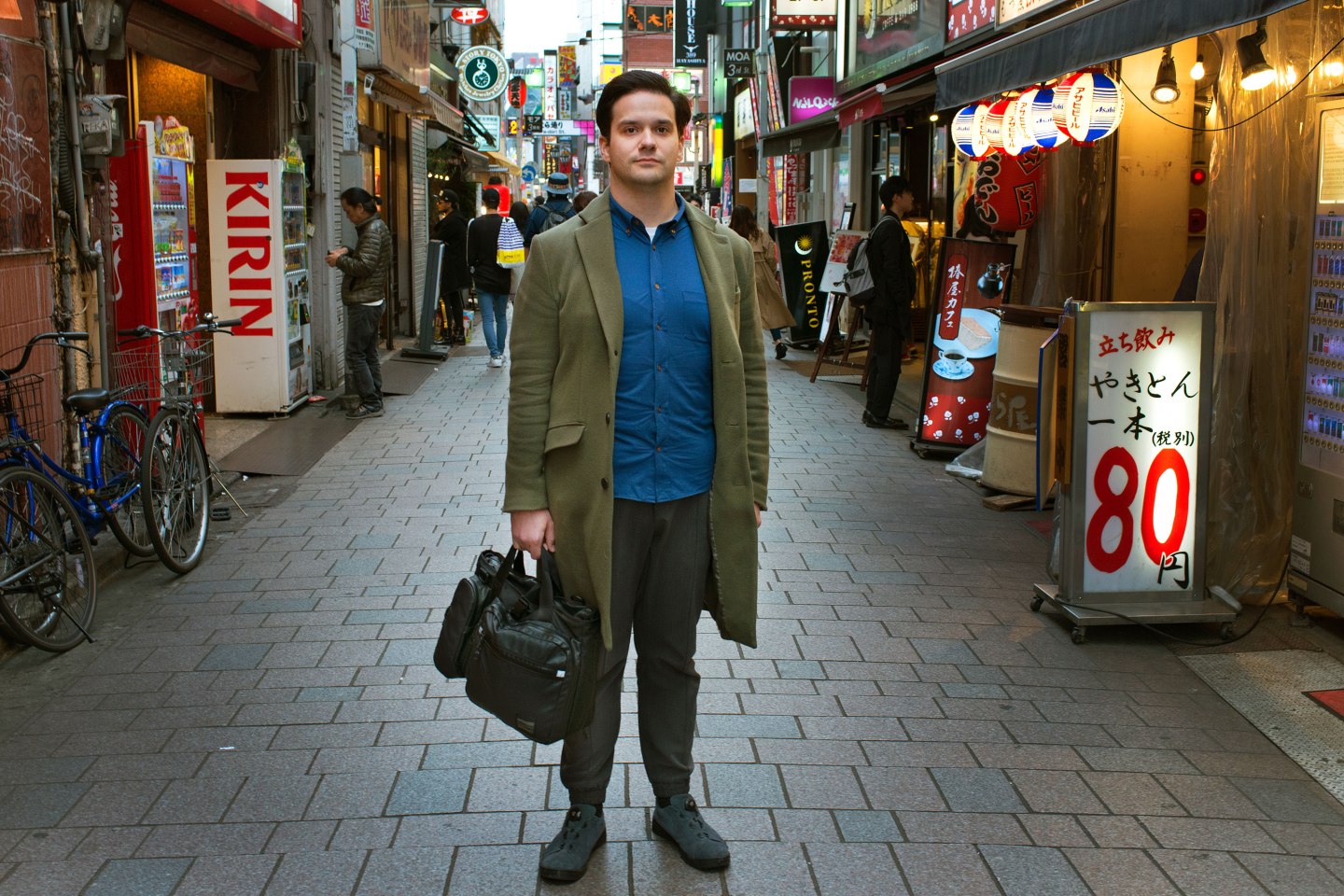 Mark Karpelès in Tokyo’s Shinjuku district. The former Mt. Gox CEO, who once felt safe leaving his laptop on a park bench, refused to set down his bag for fear of theft.