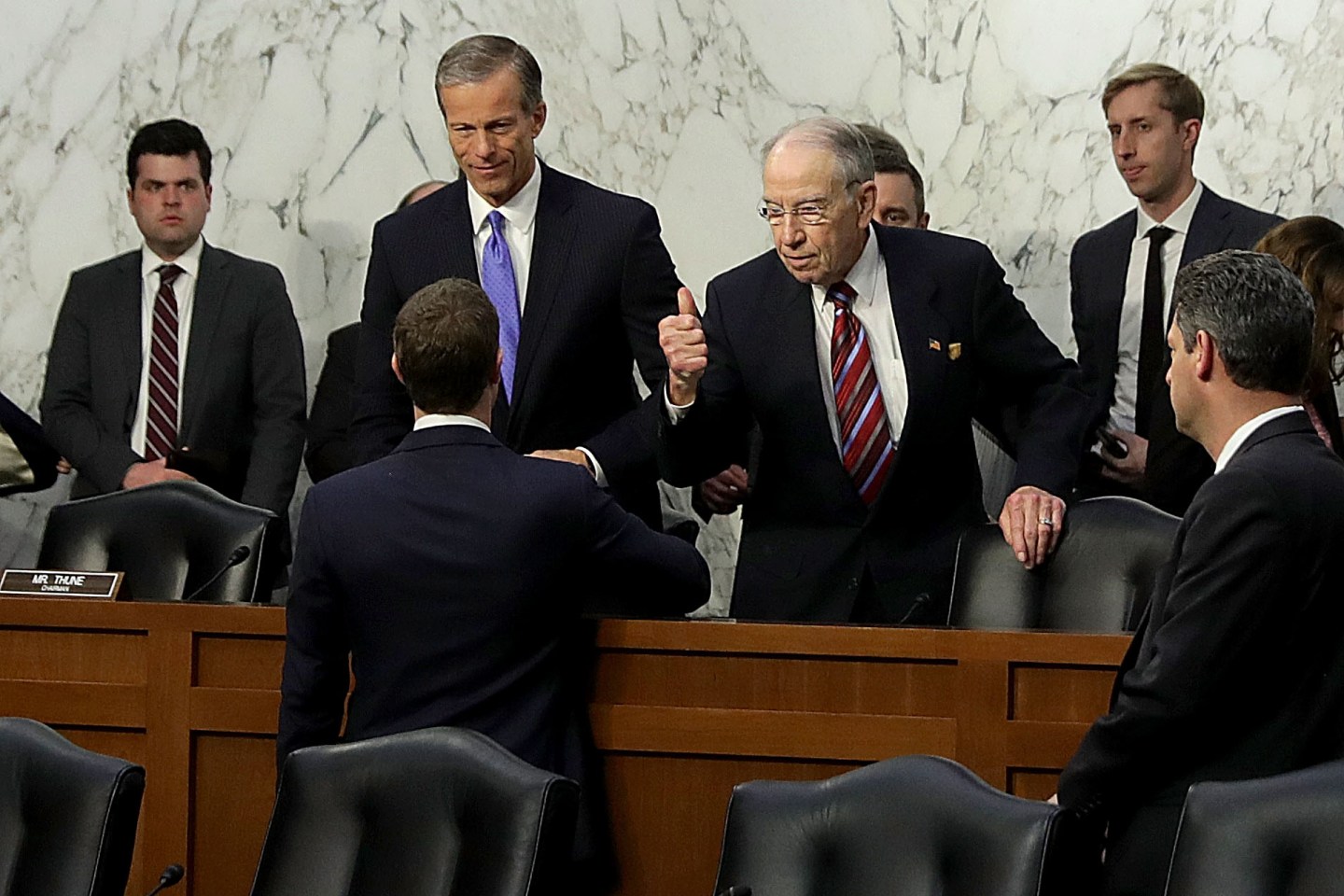 Facebook CEO Mark Zuckerberg shakes hands with senators after his congressional testimony on April 10, 2018.