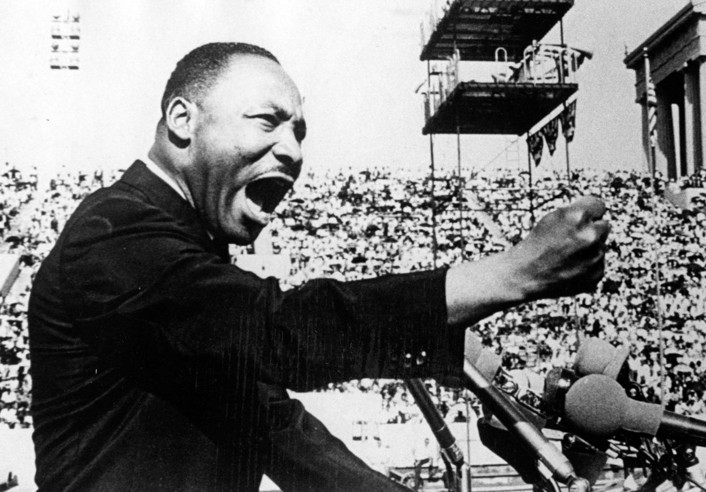 Dr. Martin Luther King Jr. gestures emphatically during a speech at a Chicago Freedom Movement rally in Soldier Field, Chicago, Illinois, July 10, 1966.