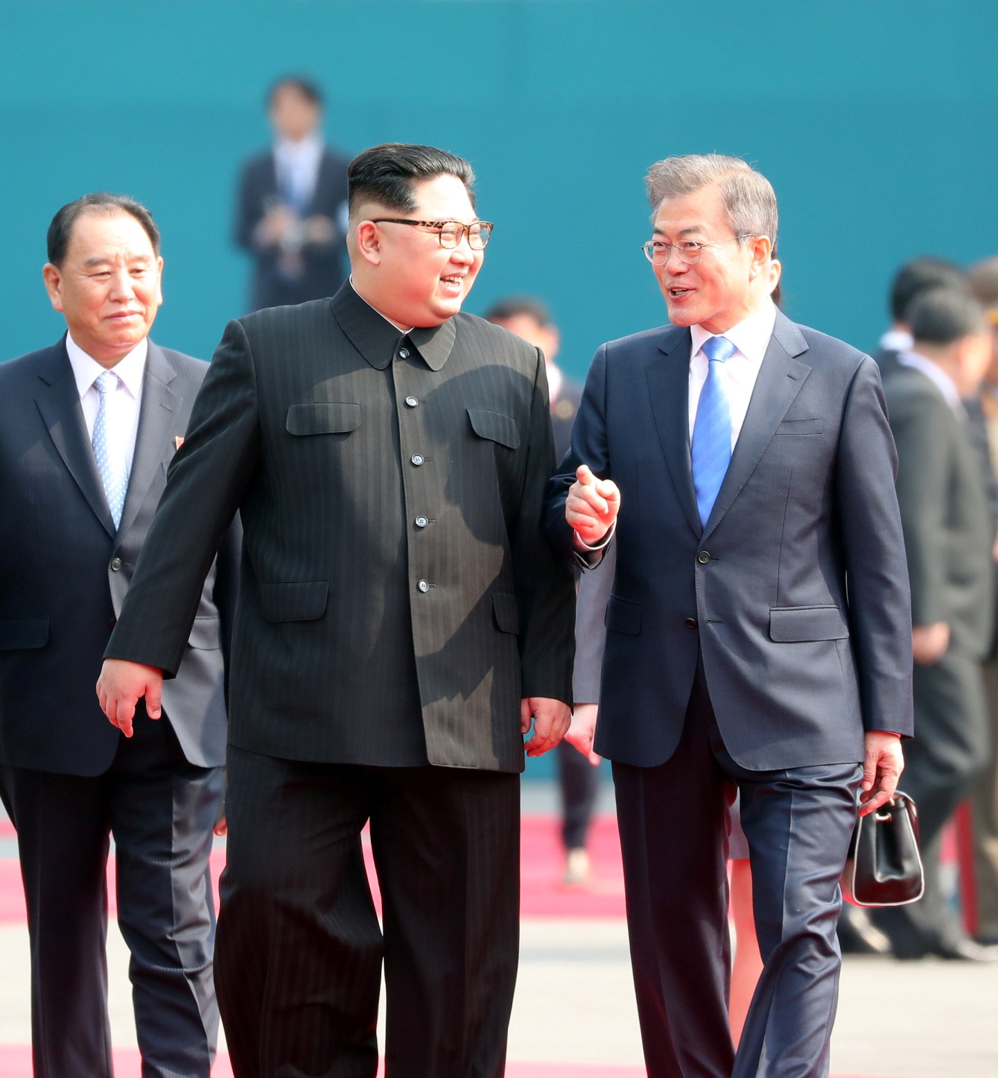 South Korean President Moon Jae-in and North Korean leader Kim Jong Un arrive at the Peace House