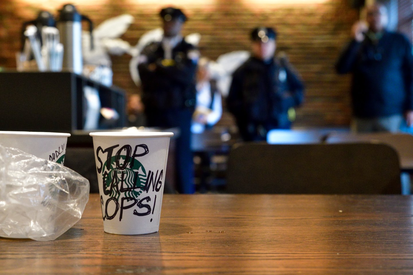 Protest cup with "Stop Calling Cops" written on it at the Starbucks location in Philadelphia where two black men were arrested.