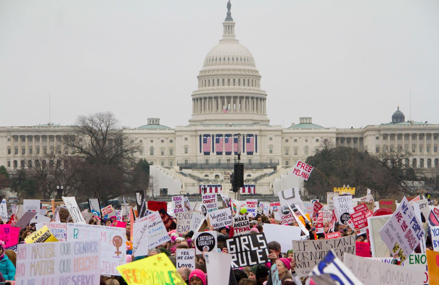People take part in the Million Woman March one day after