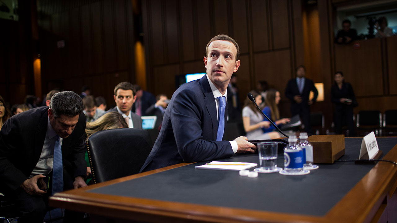 Facebook CEO Mark Zuckerberg addresses a senate hearing.