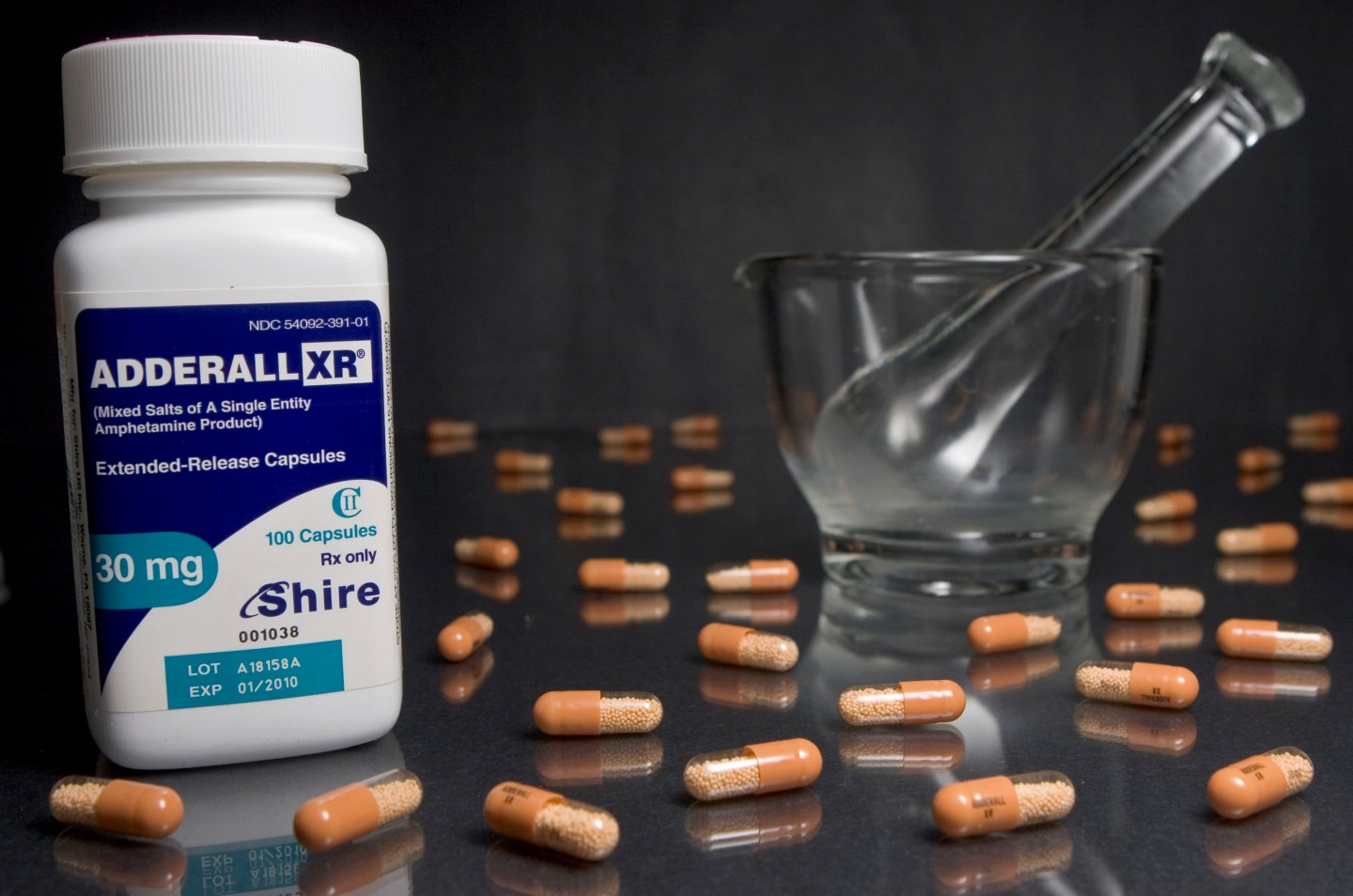 30mg tablets of Shire Plc's Adderall XR are arranged in fron
