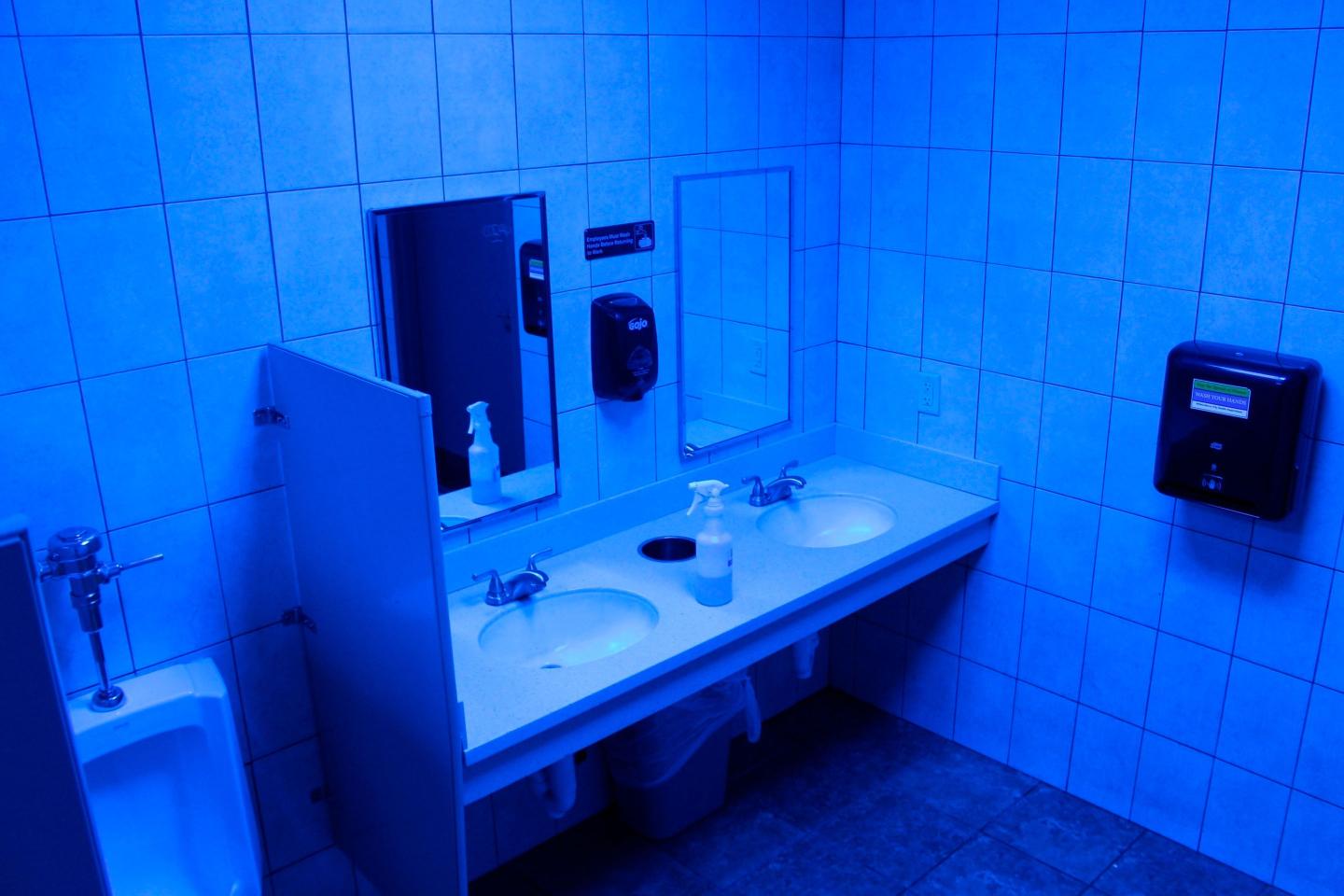 Why Retailers Are Installing Blue Lights In Bathrooms to Discourage Drug Use