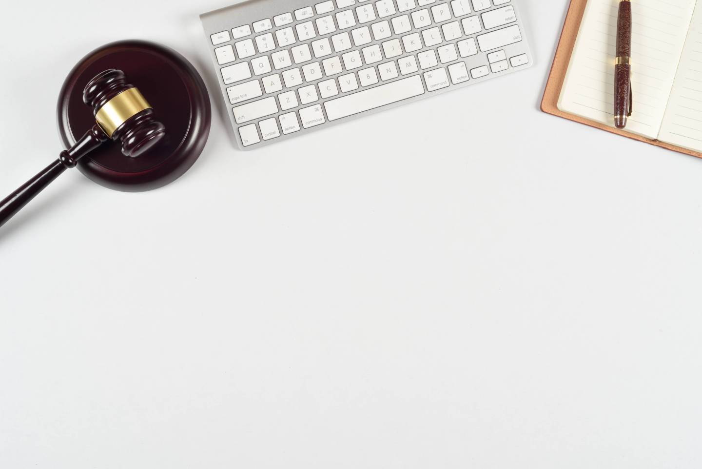 Mortgage advisory concept with Gavel, computer keyboard, document, top view flat lay