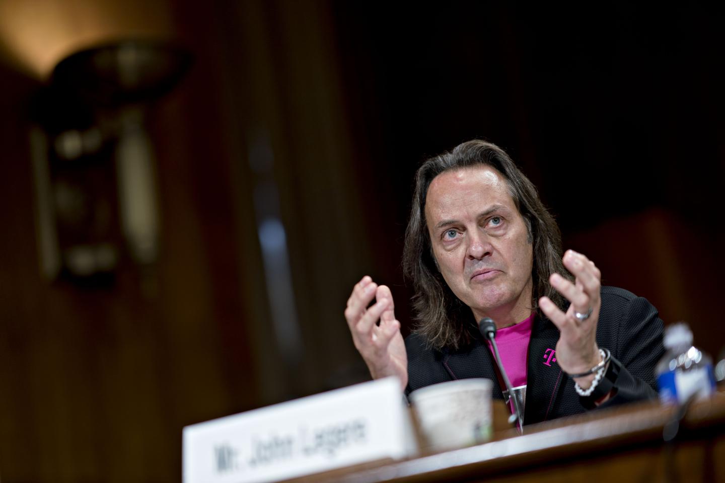 T-Mobile CEO John Legere testifies about the proposed merger with Sprint at a Senate hearing