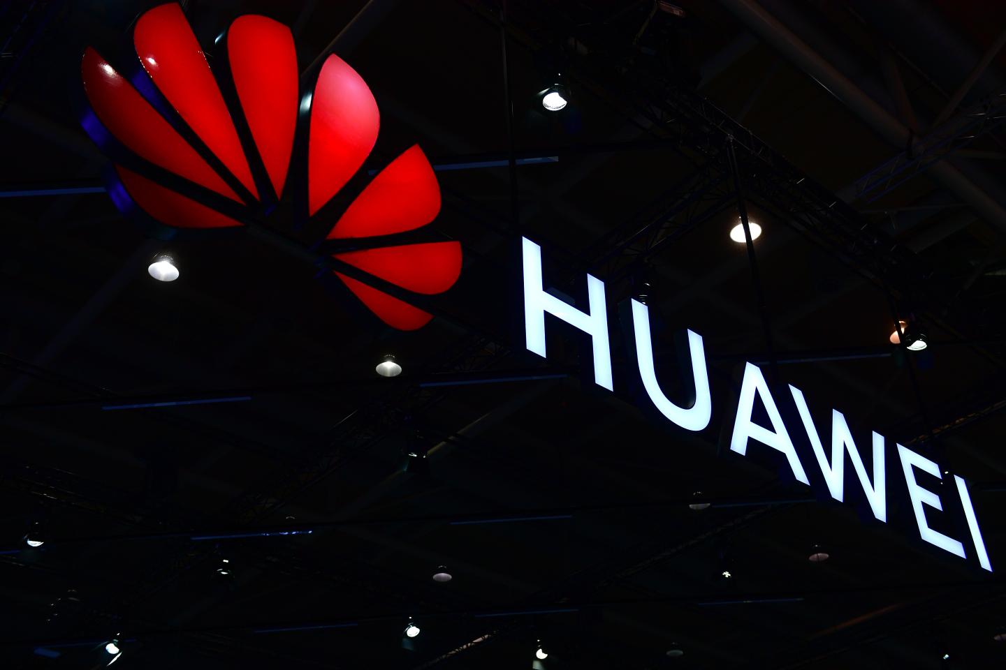 The Huawei logo is displayed at the 2018 CeBIT technology trade fair on June 12, 2018 in Hanover, Germany.