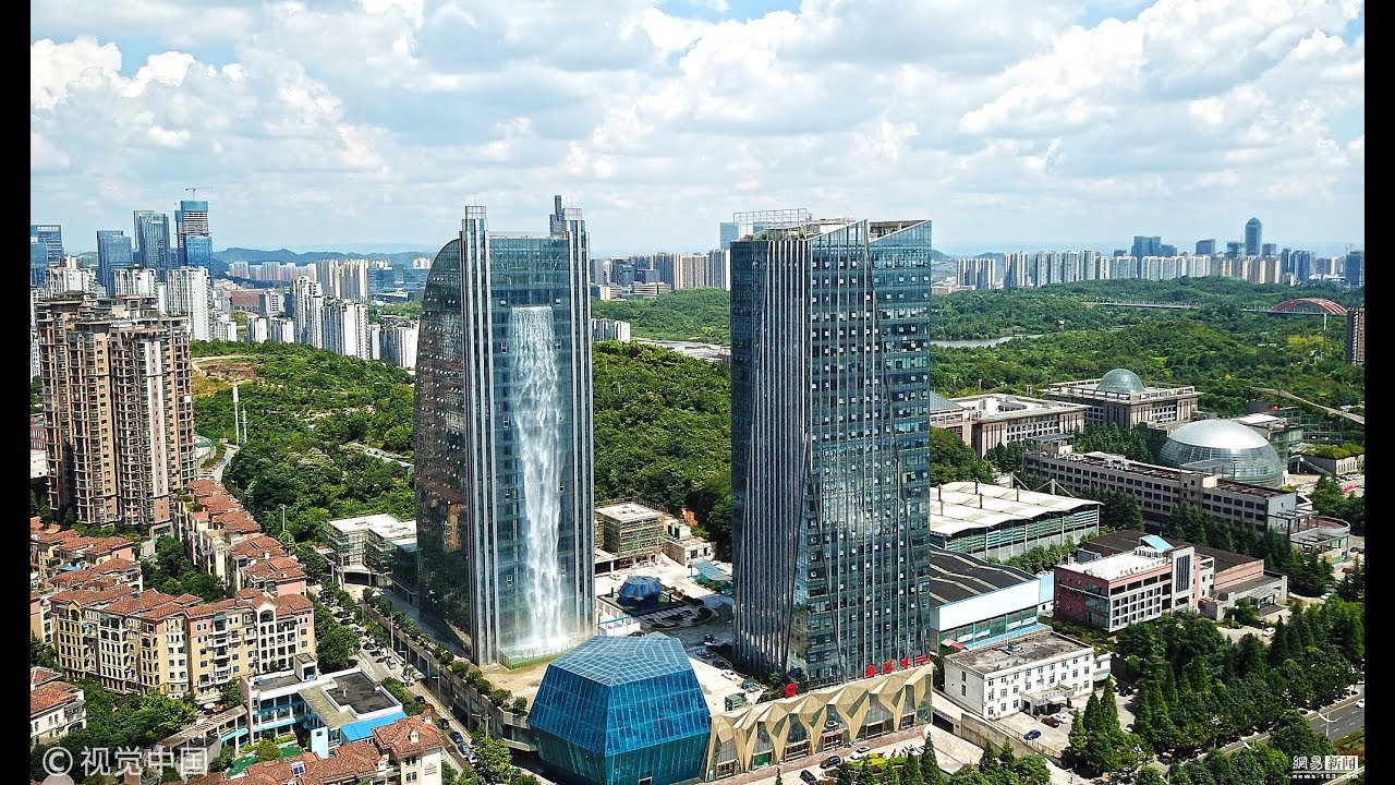 A skyscraper featuring a waterfall in Guiyang, China.