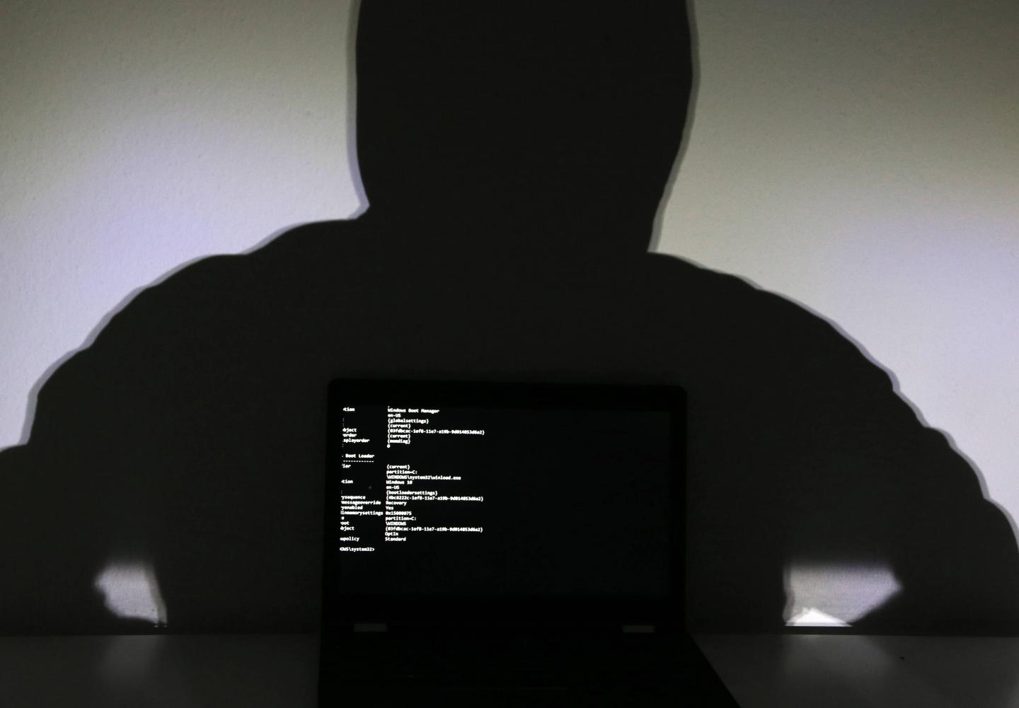Hacker in front of the screen
