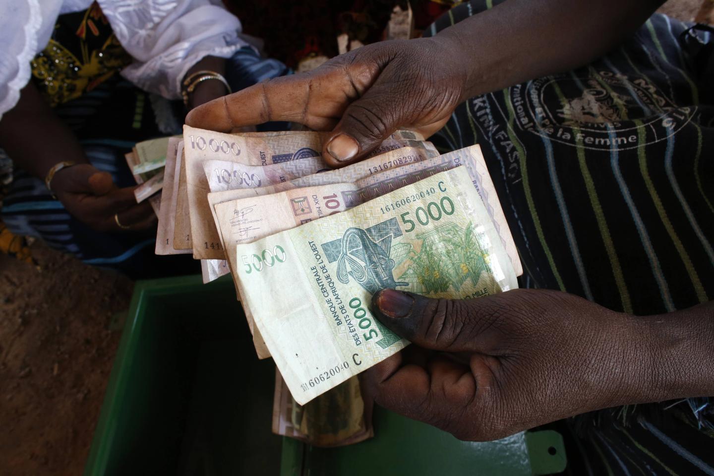 A microfinance meeting in a village in Burkina Faso.