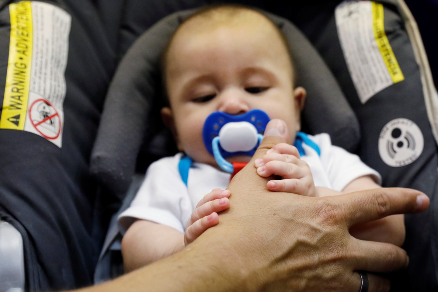 A Picture and its Story: Family reunited at U.S.-Mexico border