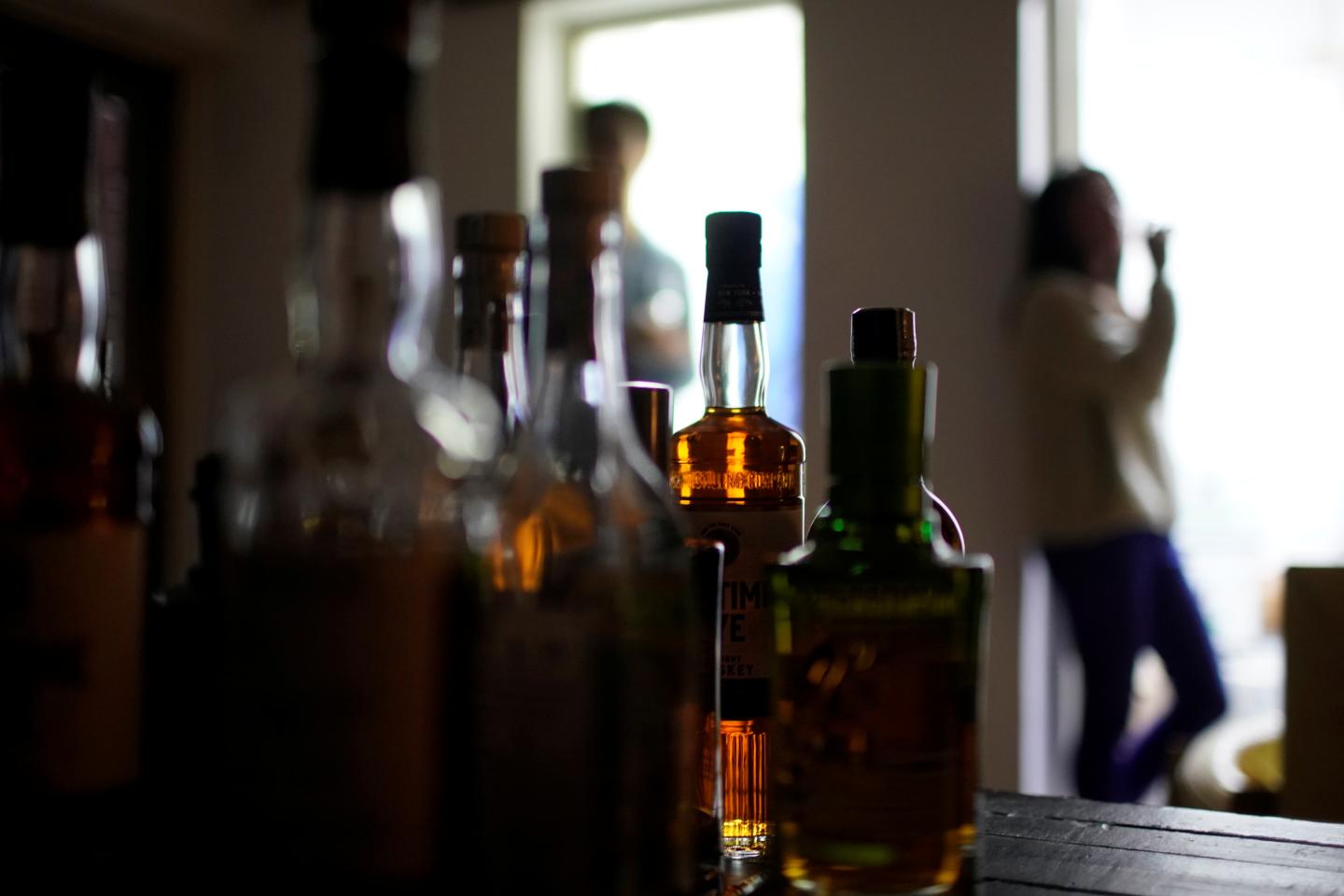 Whiskey bottles are seen at the office of a spirits distributor in Shanghai