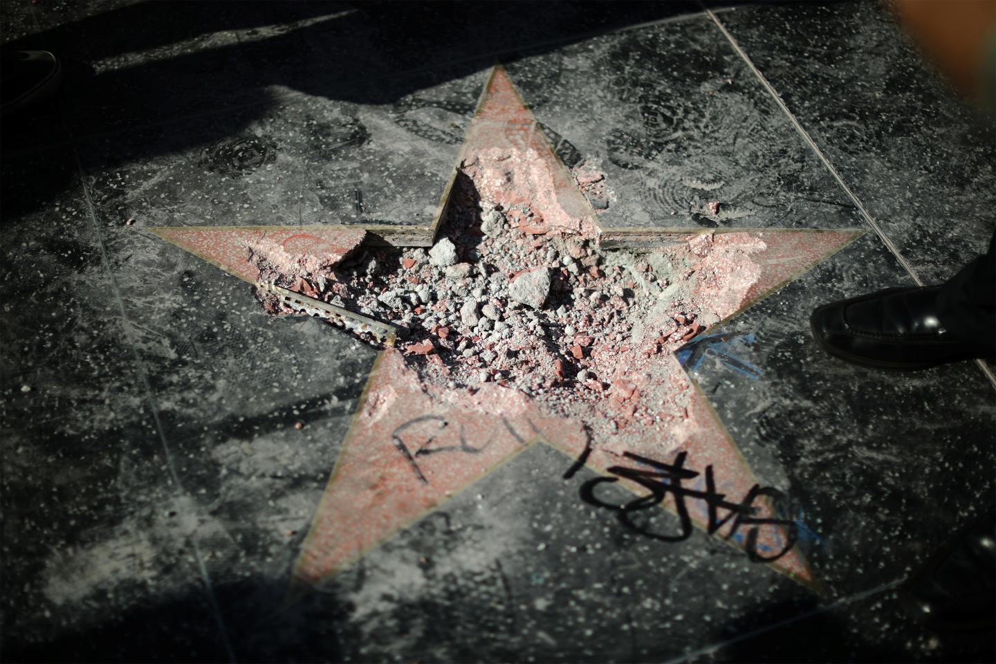 President Donald Trump's star is seen after it was vandalized on the Hollywood Walk of Fame in Hollywood, Los Angeles