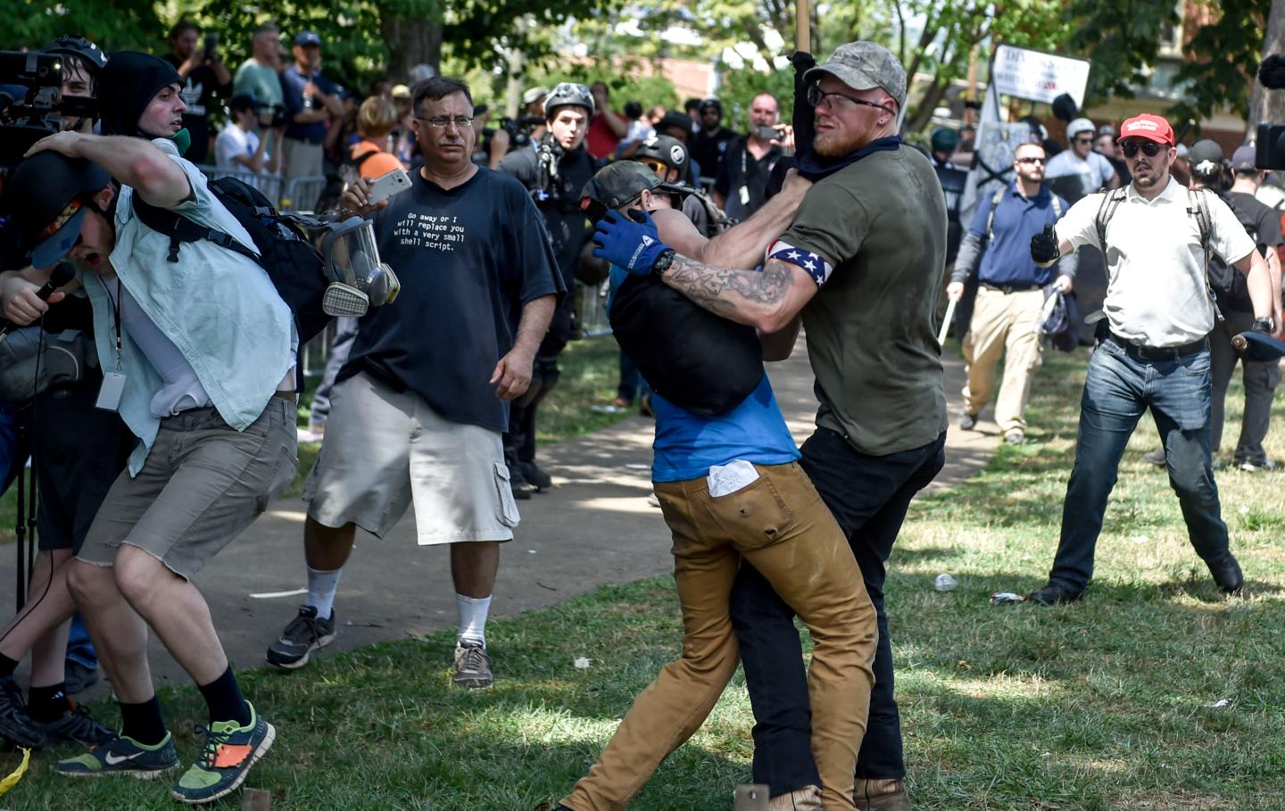 A member of the white supremacist and a protester are seen