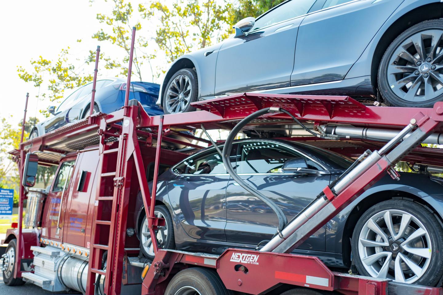 Tesla cars loaded for delivery