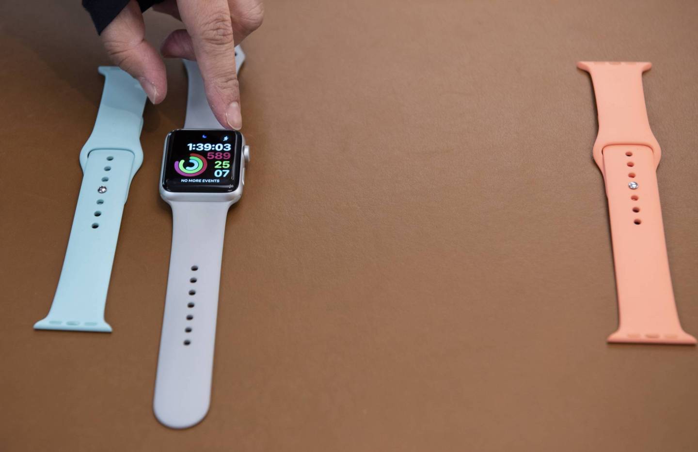 Apple employee demonstrates different Apple watch functions and