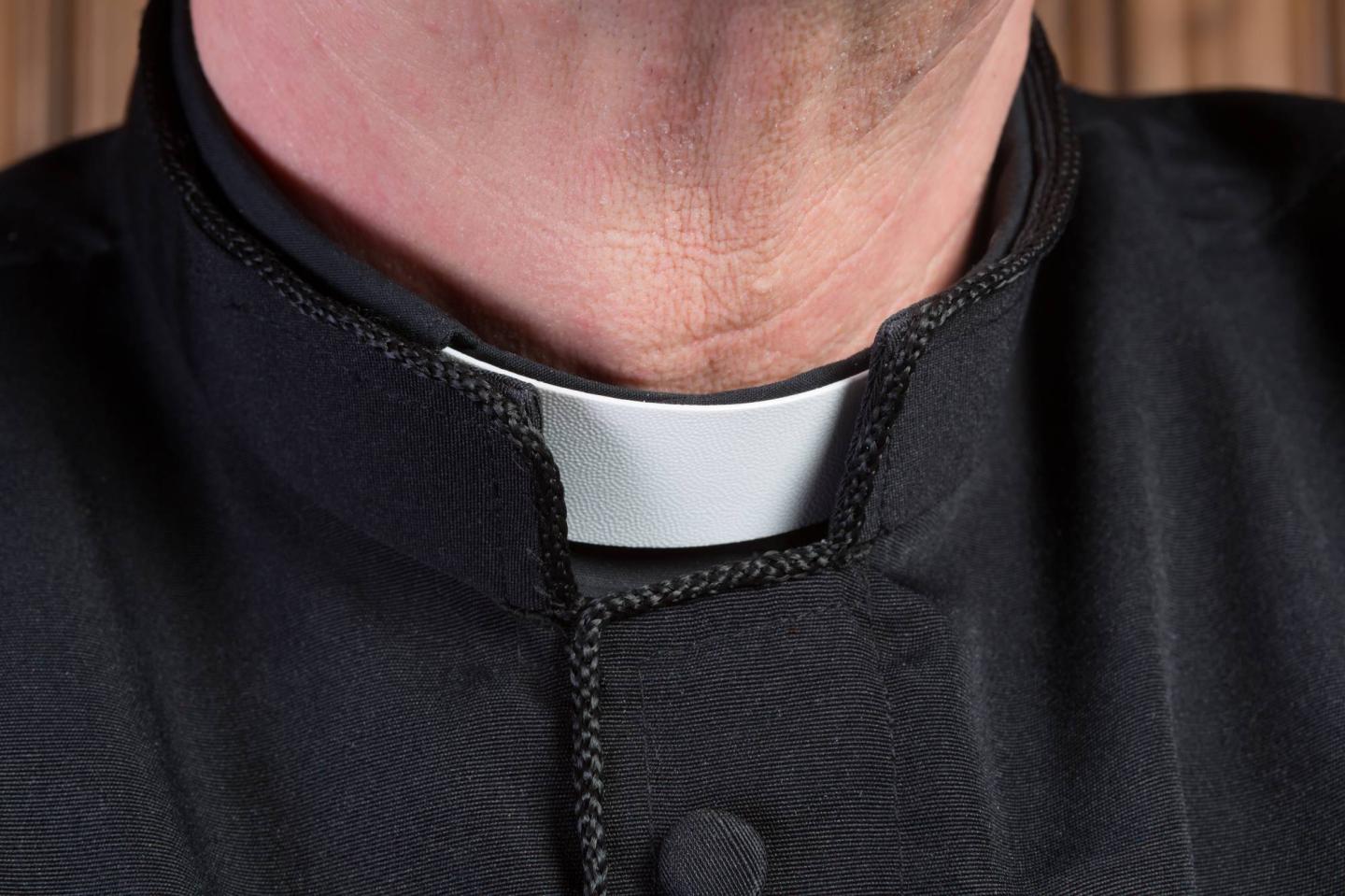 Priest clerical collar