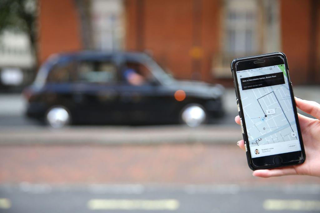 BRITAIN-US-TRANSPORT-TAXI-UBER