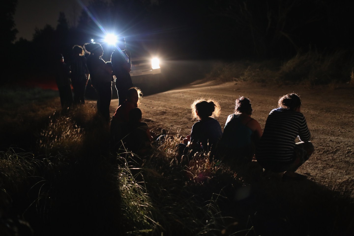 Border Patrol Agents Detain Migrants Near US-Mexico Border