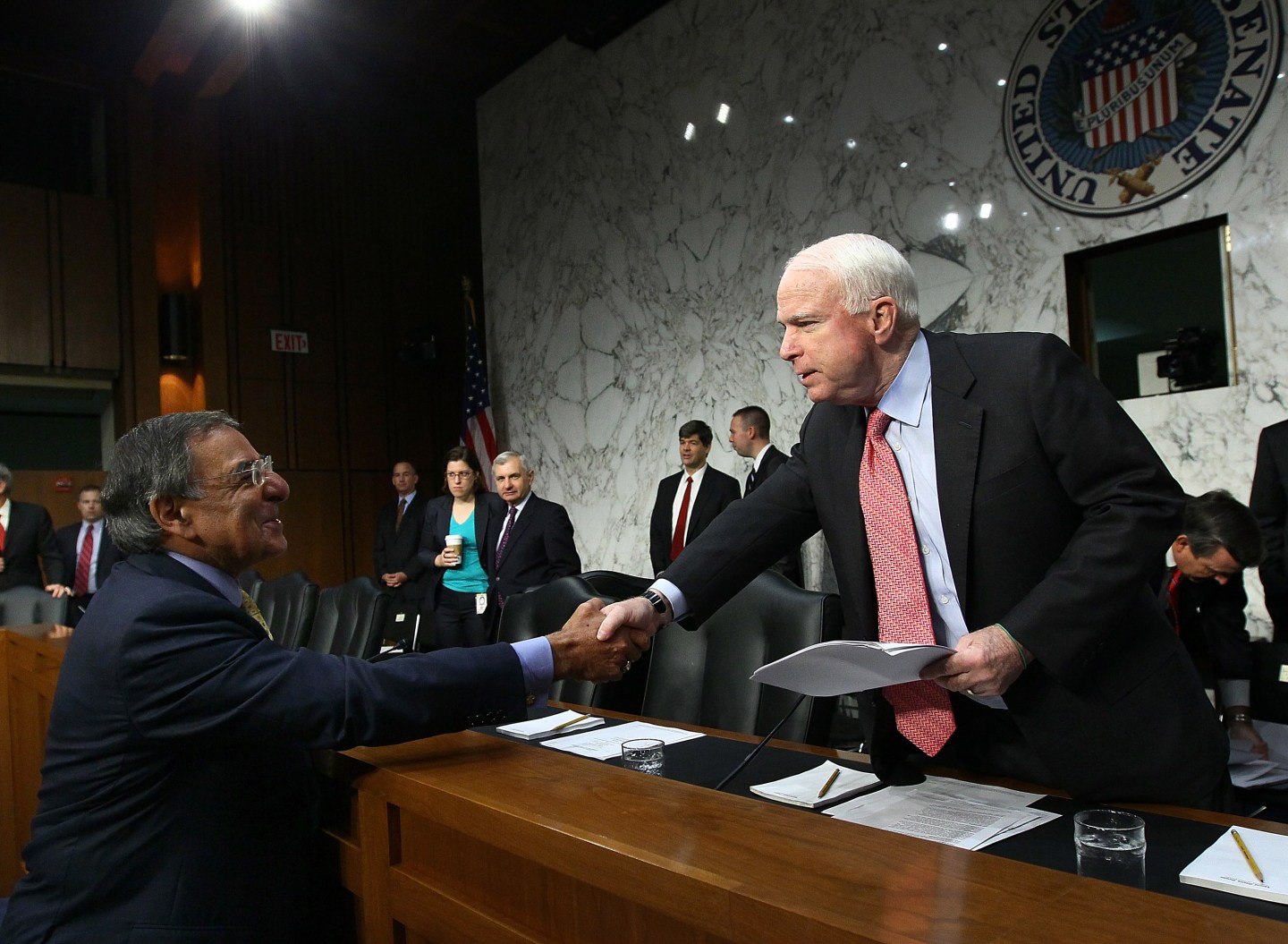 U.S. Secretary of Defense Leon Panetta greets ranking member Sen. John McCain before a hearing of the Senate Armed Services Committee on Sept. 22, 2011, in Washington, D.C.
