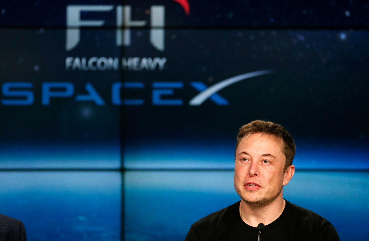 FILE PHOTO: SpaceX founder Musk speaks at a press conference following the first launch of a SpaceX Falcon Heavy rocket in Cape Canaveral