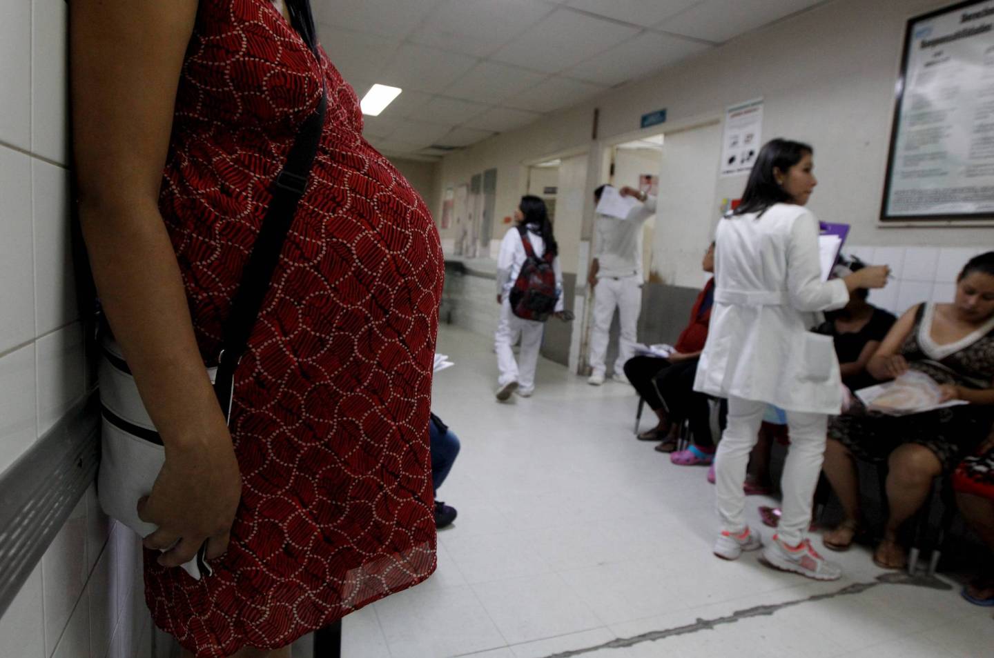 Pregnant woman waits for a routine general checkup, which includes Zika screening, at the maternity ward of the Hospital Escuela in Tegucigalpa