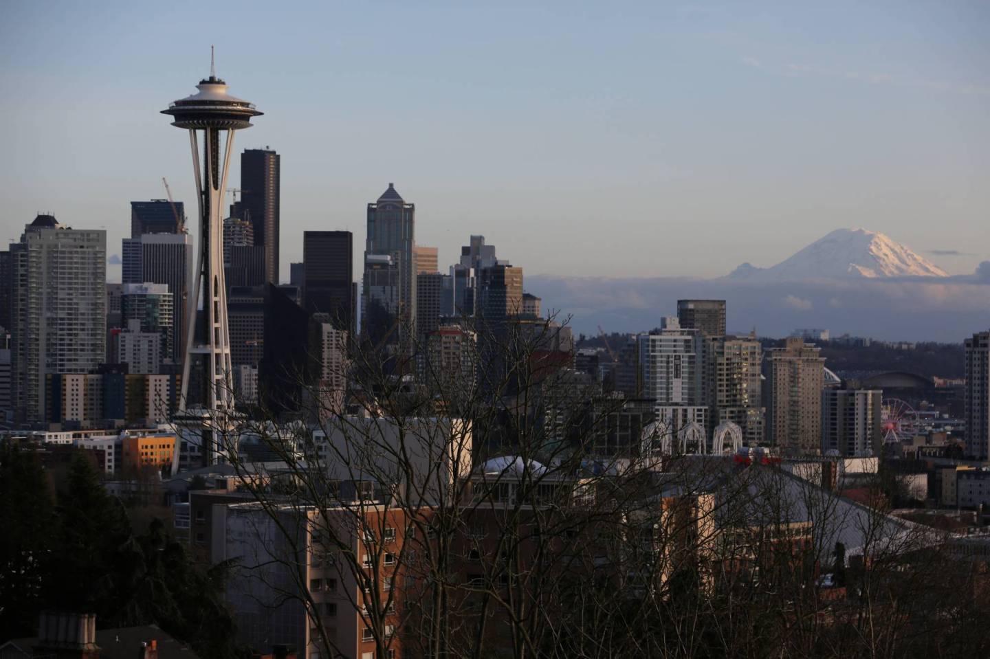The Space Needle and Mount Rainier are seen on the skyline of Seattle