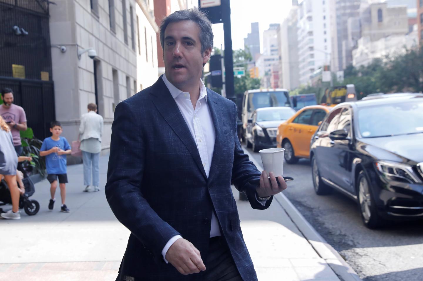 Trump's former personal lawyer Michael Cohen exits his hotel in Manhattan