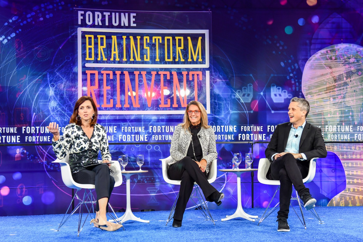 Moderator Beth Comstock (L), co-chair of Fortune's Brainstorm Reinvent conference, speaks with Melanie Kalmar, corporate vice president, chief information officer, and chief digital officer of Dow Chemical, and Aaron Levie, co-founder, chairman, and CEO of Box, at the conference in Chicago on Sept. 25, 2018.