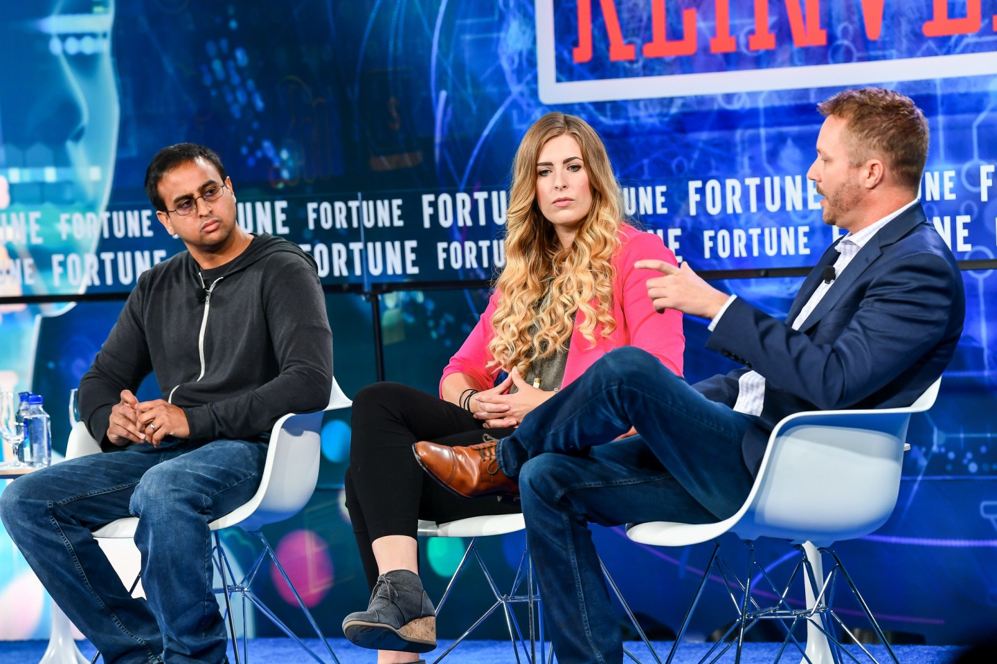 Amol Deshpande, co-founder and CEO of Farmers Business Network, Megz Reynolds, farmer at LPG Farms, and Mark Young, chief technology officer at the Climate Corporation, speaking at the Fortune Brainstorm Reinvent conference on Sept. 25, 2018, in Chicago.