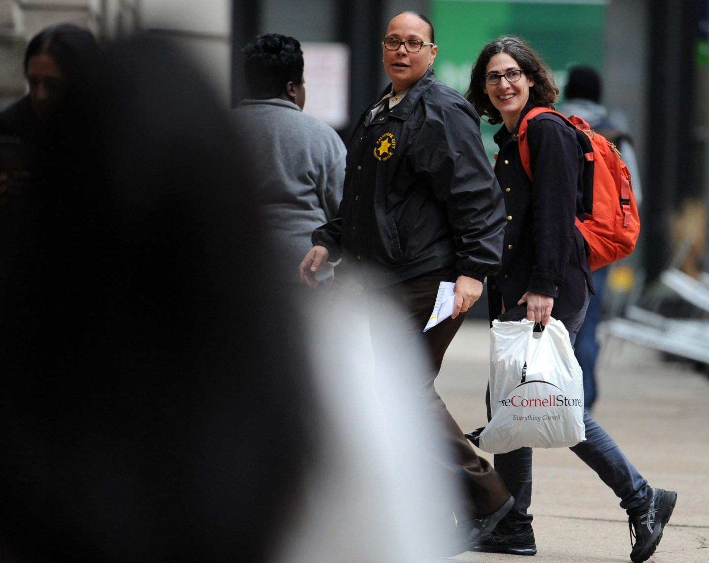 Courthouse scene, lawyers, Syed at the end of the fifth day of hearings