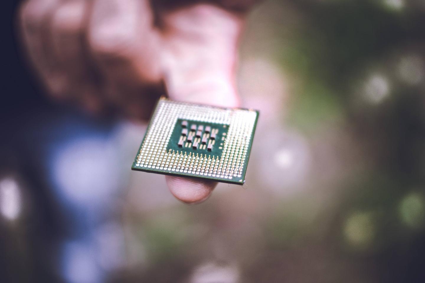 Close-Up Of Hand Holding Camera